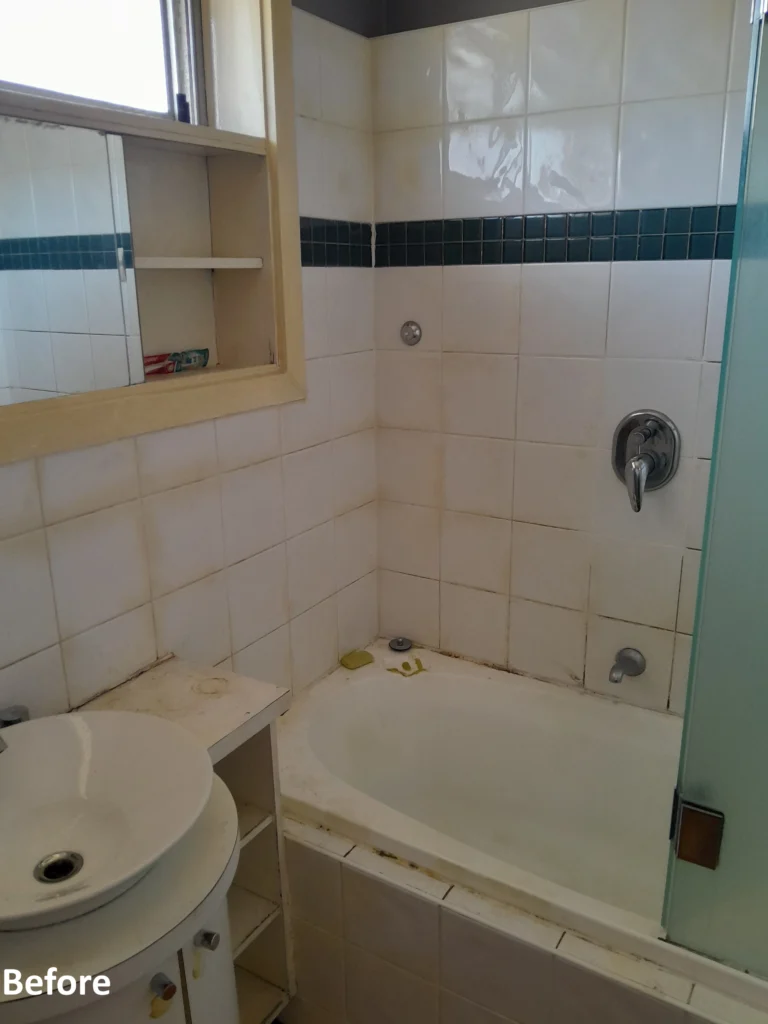Dirty bathroom with cracked grout and mould before repair – Melbourne home