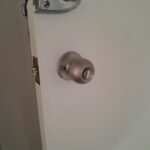 New entrance door handle installation by handyman in Melbourne’s northern suburbs – door hardware fitting and home repair services.